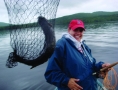 grants-camps-rangeley-maine-woman-fishing-net