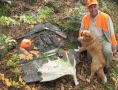 grants-camps-man-hunting-dog-antlers-grouse-rifle