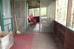 grants-camps-sporting-camp-cabin-pastureedge-porch-rangeley-maine